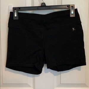 Danskin Now fitted athletic shorts with pocket.